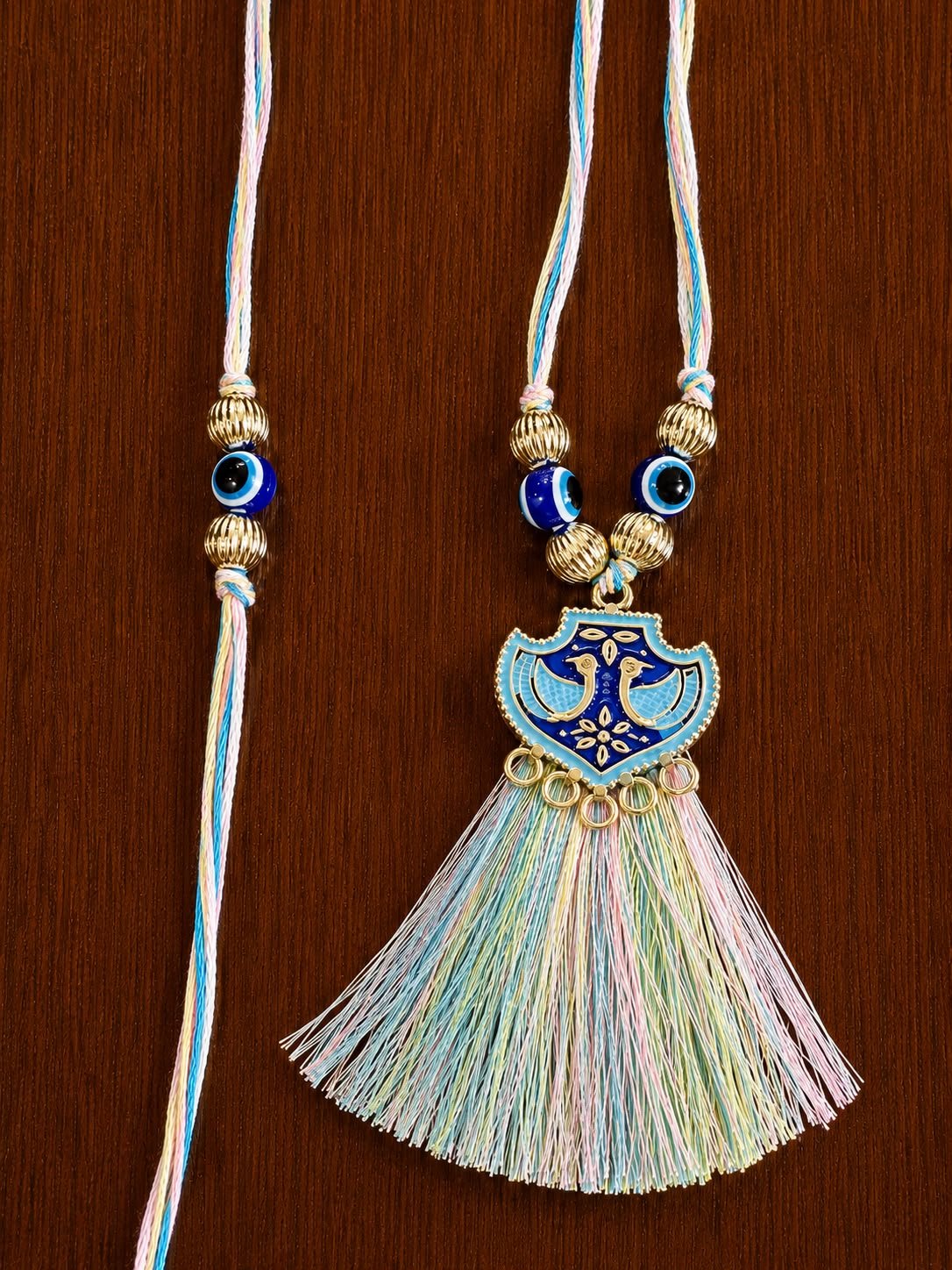 Evil Eye Peacock Metal Rakhi Set